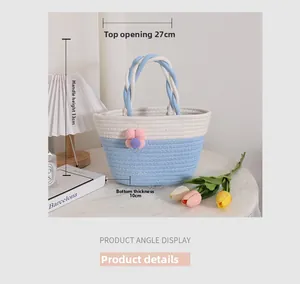 Close-up of handmade woven floral tote bag with dimensions shown in home setting