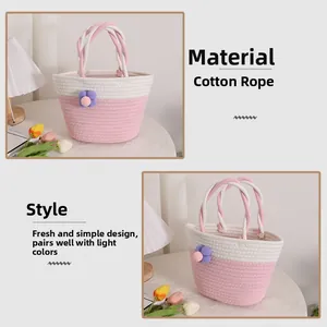 Detail of pink and white woven cotton rope bag with a purple 3D flower accessory