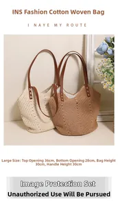 Detail of woven cotton bags in cream and brown with brown synthetic leather handles
