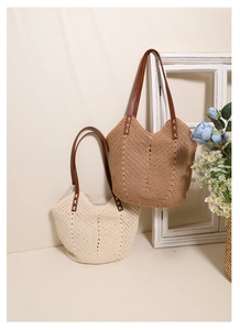 Detailed view of hand-woven cotton tote bag with leather handles and V-shaped texture
