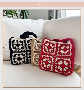 Three handmade crochet tote bags in black, khaki, and red shown on a white sofa scene