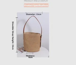 Detail view of woven straw bucket bag with dimensions 33cm diameter and 16cm thickness
