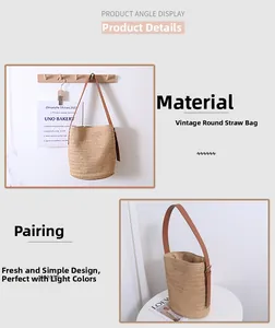 Close-up of natural straw bucket bag featuring premium brown leather shoulder straps