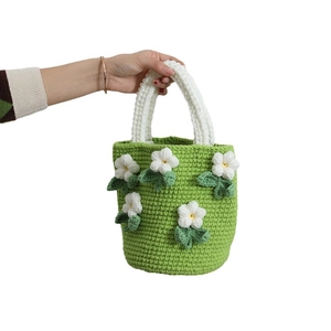 Handmade crochet camellia flower bucket bag in grass green with white knit handles