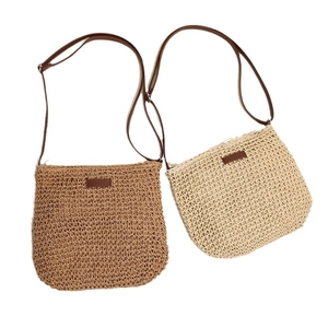 Minimalist straw woven crossbody beach bags in dark brown and creamy white colors