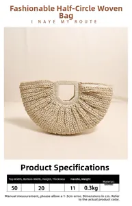 Detail view of crescent straw handbag showing measurements 50cm width and square handle