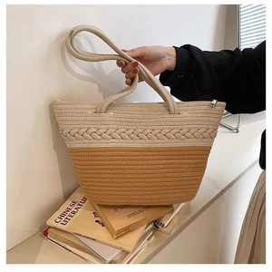 Large woven cotton shoulder bag in cream and caramel brown for beach vacations