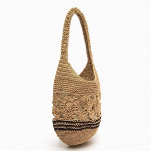 Handmade hollow floral straw shoulder bag with dark brown stripes for beach vacation