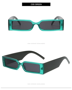 Close-up of retro green rectangle sunglasses with wide black temples and grey lenses