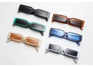 Close-up of rectangular retro sunglasses in six different colors on a white background