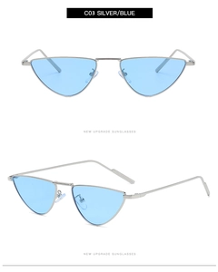 Detail of silver metal frame and blue lenses on triangular cat-eye sunglasses
