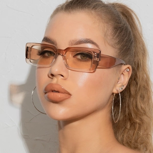 Retro square small frame sunglasses with amber frames and tea lenses on model