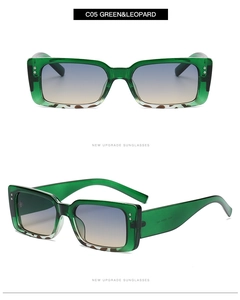 Detail of green rectangle sunglasses with leopard print temples and gradient lenses