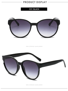 Front and side view of large black cat-eye sunglasses with purple gradient lenses