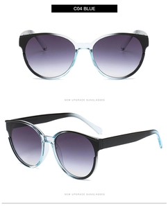 Macro detail of oversized cat-eye sunglasses with purple gradient lenses and two-tone frames