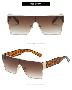 Détails lunettes de soleil carrées visière avec verres dégradés marron et branches léopard