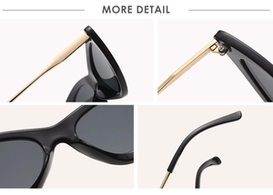 Detail view of reinforced hinges and golden metal temples on black cat eye sunglasses