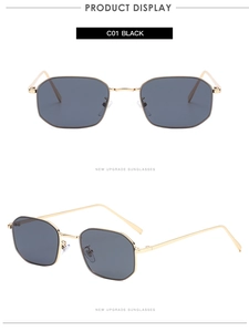 Detailed view of polygon sunglasses with black lenses and gold metal frames