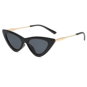 Retro cat-eye sunglasses with thick black frames and slim gold metal temples for women