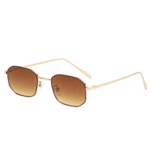 Retro small octagonal sunglasses with gold metal frame and brown gradient lenses