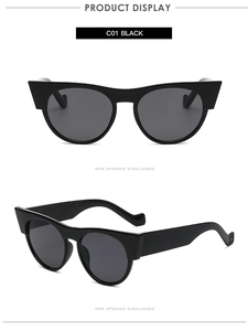 Vue détaillée de lunettes de soleil œil-de-chat noires avec verres anti-UV