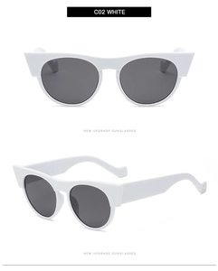 Détail de lunettes de soleil œil de chat blanches élégantes avec monture rétro chic