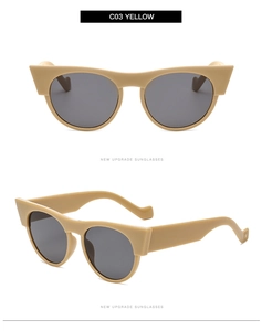 Vues détaillées des lunettes de soleil œil de chat jaunes avec verres anti-UV