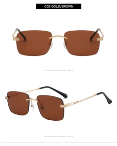 Détail de lunettes de soleil sans monture avec branches dorées torsadées et verres bruns