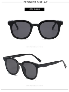 Vorder- und Seitenansicht der ovalen schwarzen Sonnenbrille mit glänzenden Rahmen