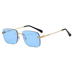 Lunettes de soleil carrées vintage sans monture avec verres bleus et branches dorées
