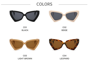 Dettaglio occhiali da sole cat-eye in nero, beige, marrone chiaro e maculato leopard