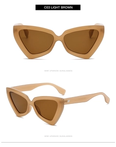 Dettaglio occhiali da sole vintage cat-eye con montatura marrone chiaro e accenti in metallo
