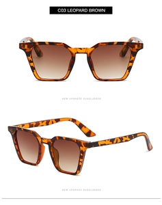 Vue détaillée de lunettes de soleil œil de chat léopard marron avec verres dégradés
