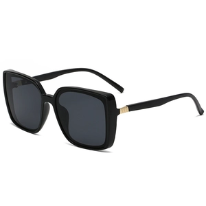 Classic oversized square sunglasses with black frame and golden metal temple details