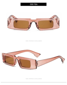 Detail view of tea-colored rectangular sunglasses with thick frame and dark lenses