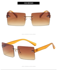 Detail view of rimless square sunglasses with brown gradient lenses and metal hinges