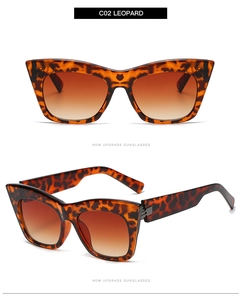 Close-up of leopard print cat-eye frames with gradient brown lenses and side profile detail