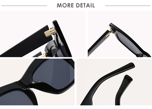 Detail view of cat eye sunglasses showing gold metal hinges and black polished frame