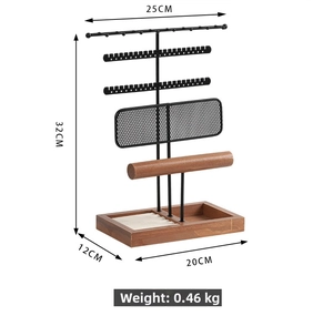 Detailed technical drawing of jewelry stand with dimensions 25cm by 32cm in black metal