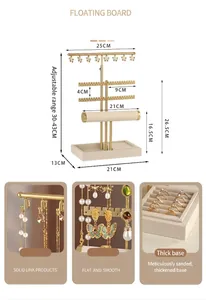 Adjustable beige and gold jewelry tower showing hooks, earring holes and ring tray dimensions