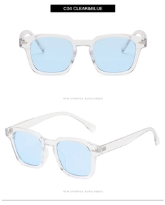 Detail of transparent square sunglasses with light blue lenses showing the side frame