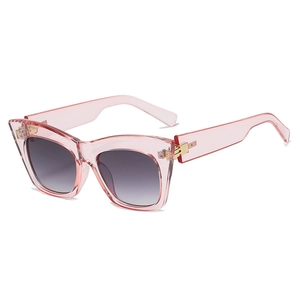 Pink cat-eye sunglasses with gradient lenses and oversized frame for outdoor wear