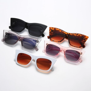 Collection of stylish large-frame cat-eye sunglasses in multiple colors and gradient lenses