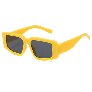 Lunettes de soleil carrées jaunes avec monture épaisse et verres UV foncés