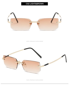 Detail of square rimless sunglasses with gradient brown lenses and gold metal temples