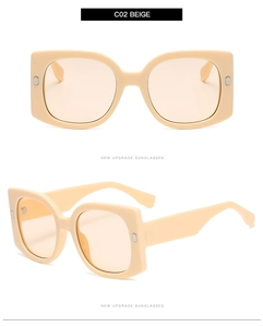 Detailed views of beige oversized square sunglasses with silver metal hinges and orange lenses