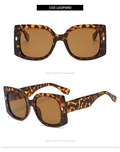 Detailed views of leopard print square sunglasses with silver metal rivets and brown lenses