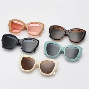 Collection of five wide-frame cat-eye sunglasses in multiple colors and tinted lenses