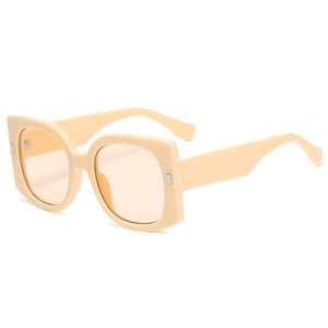 Vintage oversized square sunglasses in cream beige with tinted lenses shown from 45-degree angle