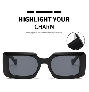 Detail view showing sturdy wide temples and sleek square frame of black sunglasses